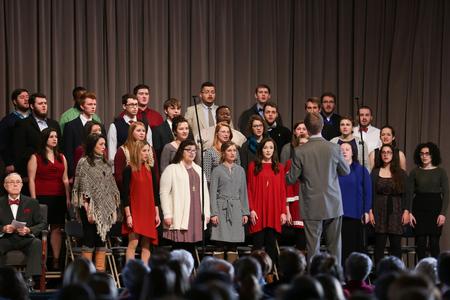 The University Singers lead the congregation in a song during Founders' Day chapel.  - Photo by Kristi McMurry Woody