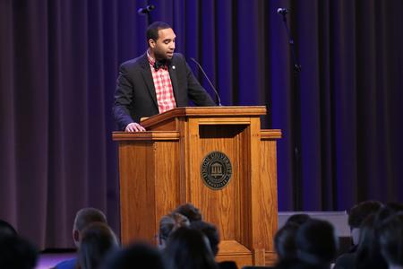 Matthew Marshall, director for service and diversity initiatives, leads the congregation in an opening prayer during chapel. - Photo by Kristi McMurry Woody