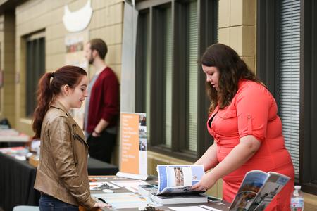 Students browse the external study options at the Study Abroad Fair in the SUB. - Photo by Kristi McMurry Woody