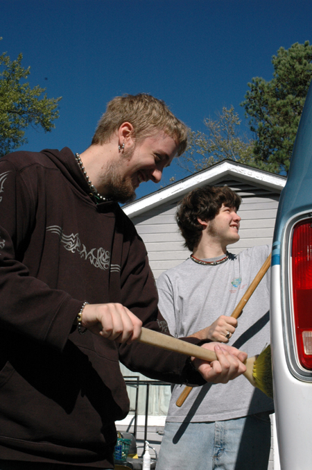 Junior Josh Hutcheson and sophomore Tyson Cadenhead washes a van at Birth Choice during Day of Remembrance. - Photo by Amanda Herron