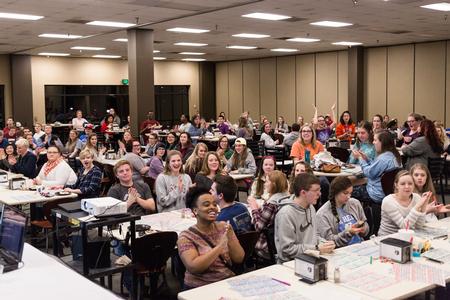 After the last number is called, the Brewer Dining Hall echoes with sounds of cheer as Bingo Night players celebrate. - Photo by David Parks