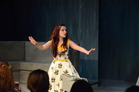 Larissa Catalano, freshman theater major, performs in the LipSync Battle. - Photo by Gretchen Foels