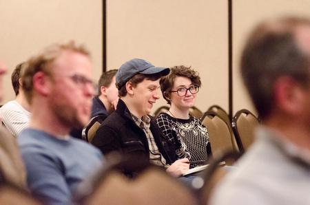 TESL majors Caleb Hall, junior, and Amy Knack, sophomore, enjoy hearing Gerardo Marti's Scholar-in-Residence Lecture, "The Future of Worship and the Church" in the Carl Grant Events Center. - Photo by David Parks