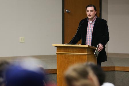 George David Clarke reads excerpts from his poetry collection <em>Reveille</em> during the Creative Writing Workshop. - Photo by Kristi McMurry Woody