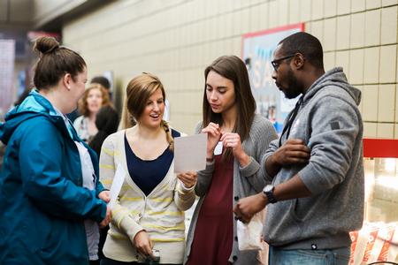 Students stop to read materials from a booth at the Social Work Awareness Day event in the SUB hallway. - Photo by Kristi McMurry Woody
