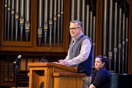Todd Brady, vice president for university ministries, asks students to pray for spring Go trips. - Photo by Gretchen Foels