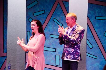Elizabel Riggs, senior theater major, and Dub Oliver, president of the university, portray Russian spies at the Blank Slate "Dub" Show. - Photo by Gretchen Foels
