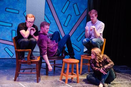 Members of the Blank Slate Improv team portray wolves at a restaurant at the "Dub Show." - Photo by Gretchen Foels