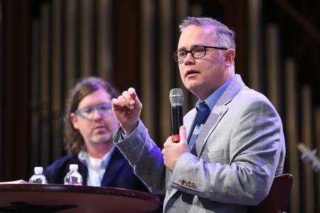 Todd Brady, vice president for university ministries, introduces Ted Kluck, assistant professor of communication arts, for a chapel interview. - Photo by Kristi McMurry Woody