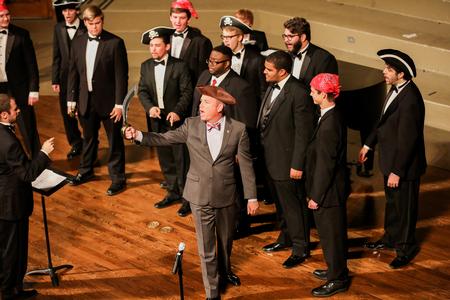 Dub Oliver, president of the university, has a cameo appearance during the spring choral concert with the men's choir.  - Photo by Kristi McMurry Woody