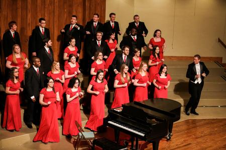 The University Singers sing and dance at the spring choral concert. - Photo by Kristi McMurry Woody