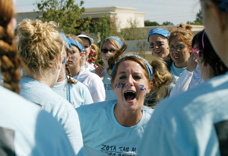 Zeta Whitney Culver shows some spirit with her sisters during the Greek Olympics. - Photo by Kristen Hiller