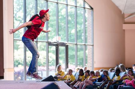 Nathaniel Magnuson, senior English major, gives quite an energetic performance during a song in <i>Alexander and the Terrible, Horrible, No Good, Very Bad Day</i>.  - Photo by David Parks