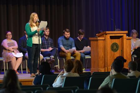 Angela Taylor, senior biochemistry major, reads during chapel lead by the honors community in the G.M. Savage Memorial Chapel. - Photo by MiKalla Cotton