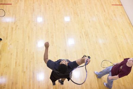 A racquetball class practices on the court. - Photo by Kristi McMurry Woody