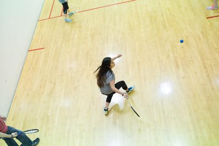 A racquetball class practices on the court. - Photo by Kristi McMurry Woody