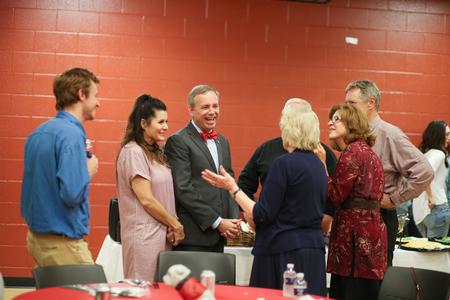 Dub and Susie Oliver, president and first lady of the university, chat with graduating seniors and their families at the Senior Send-off event. - Photo by Kristi McMurry Woody