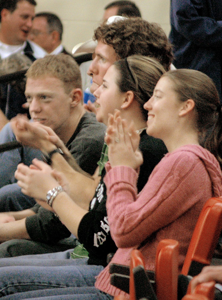 Sophomore Douglas Martin, undecided major,
and friends cheer on the volleyball team at a big conference game.
 - Photo by Lauren Crane