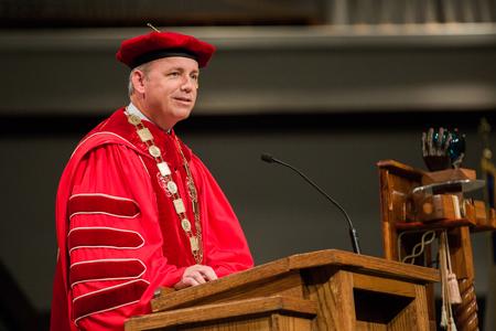 Dub Oliver welcomes guests to Summer Commencement.  - Photo by Kristi McMurry Woody