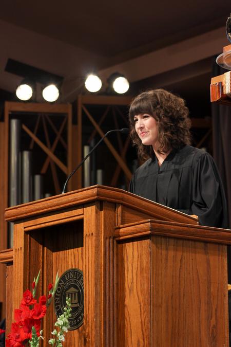 Kaylee Gibson, senior public relations major and current SGA president finishes her address to faculty, staff and students at Convocation.  - Photo by Morgan Morfe