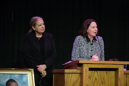 Nita Mehr and Theresa Blakley, professors of social work, address guests of the Remember Me Commemorative Walk, which honors loved ones lost to homicide. - Photo by Kristi McMurry Woody
