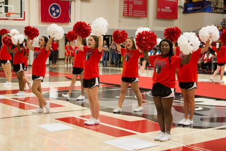 Union University's cheerleaders pump up the crowd during Bulldog Madness.  - Photo by Morgan Morfe