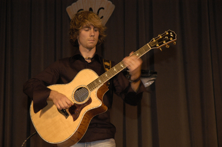 Dan Schafers, music performance major, shares his skills for Lambda Chi Alpha during All-Sing 2004. - Photo by Kathleen Murray