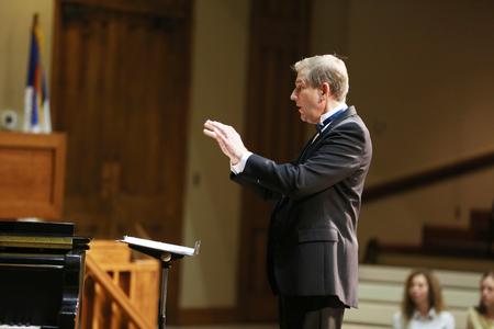 David Dennis, professor of music, conducts the women's choir, Cantilena, during the Fall Choral Concert held at First Baptist Church. - Photo by Kristi McMurry Woody