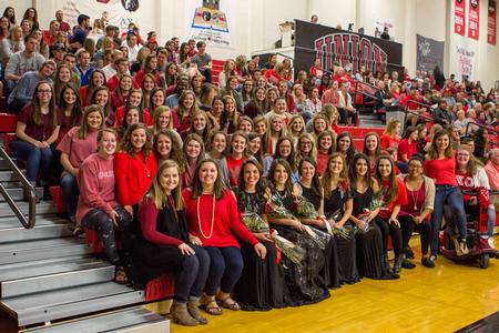 The ladies of Chi Omega smile with representatives from the 2016 Homecoming Court.  - Photo by Morgan Morfe