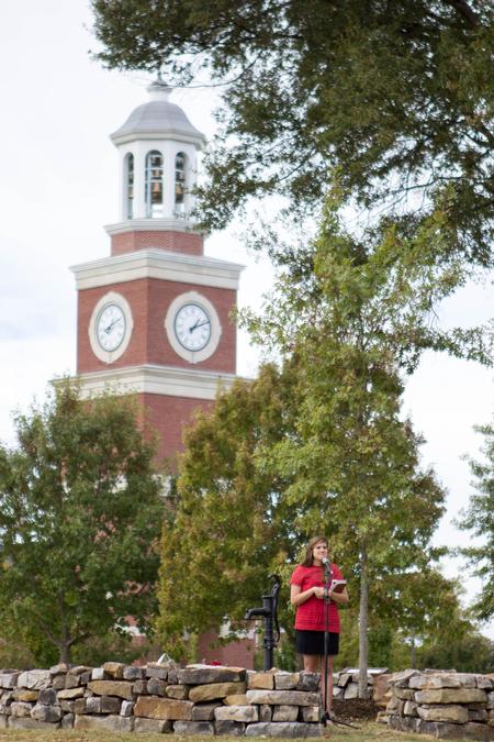 Katie Green, senior Nursing major, gives a speech in memory of Leighton Williams during a dedication of the Oasis memorial.  - Photo by Morgan Morfe
