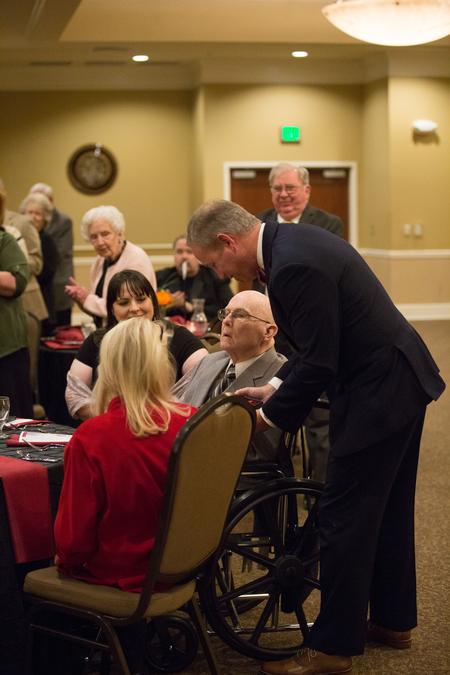 Dub Oliver, president of the university, presents David Blackstock ('64) with the alumnus of the year award during the Meritorious Service Awards Banquet. - Photo by Kristi McMurry Woody