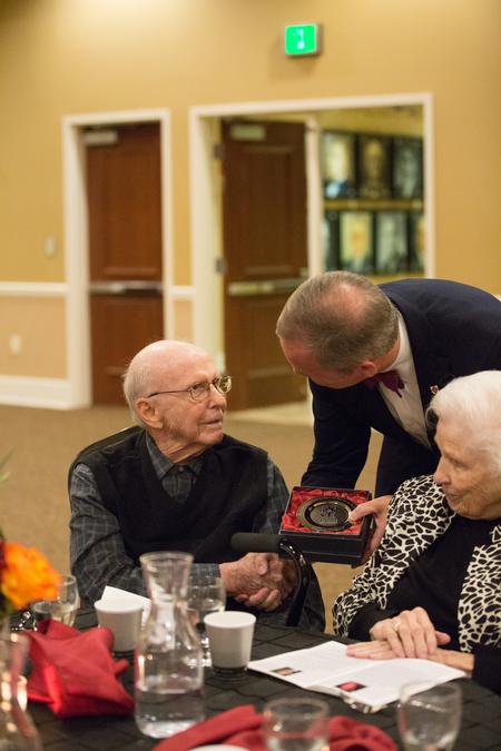 Bill Gregory ('48) receives the Distinguished Achievement Award in Arts/Media during the Meritorious Service Awards Banquet. - Photo by Kristi McMurry Woody