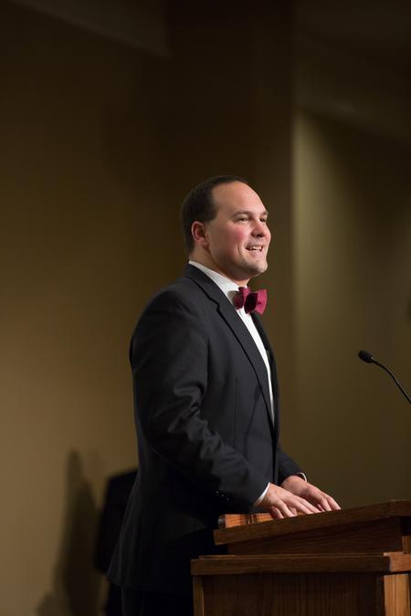 Justin Wainscott ('02) accepts the Distinguished Achievement Award in Church Ministry during the Meritorious Service Awards Banquet. - Photo by Kristi McMurry Woody