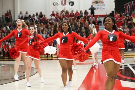 The cheer team pumps the audience up before the Lady Bulldogs homecoming game. - Photo by Kristi McMurry Woody