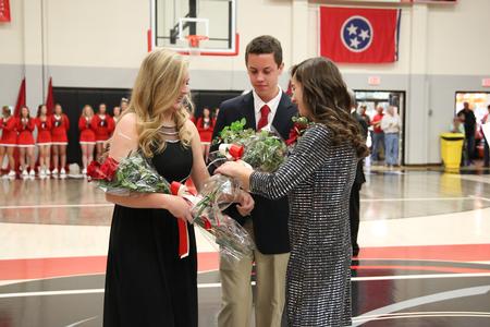 Senior Kelly Gwartney accepts her flowers and crown as the 2016 homecoming queen during halftime of the Lady Bulldogs game. - Photo by Kristi McMurry Woody