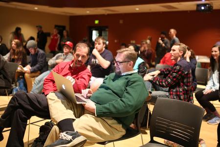 Sean Evans, professor of political science and department chair, and Hunter Baker, associate professor of political science, watch the election results with students in the Bowld Student Commons.  - Photo by Kristi McMurry Woody