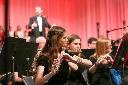 Elise Brewer, sophomore music education major, plays with the symphonic band during A Union Christmas. - Photo by Kristi McMurry Woody
