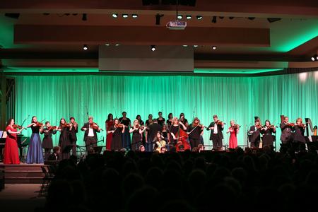 Students, faculty and staff perform with community music program students in A Union Christmas.  - Photo by Kristi McMurry Woody