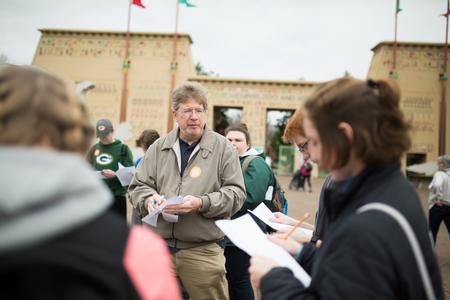 Mark Bolyard, professor of biology and department chair, gives out assignments for a field trip to the zoo with his BIO 100 class. - Photo by Kristi McMurry Woody