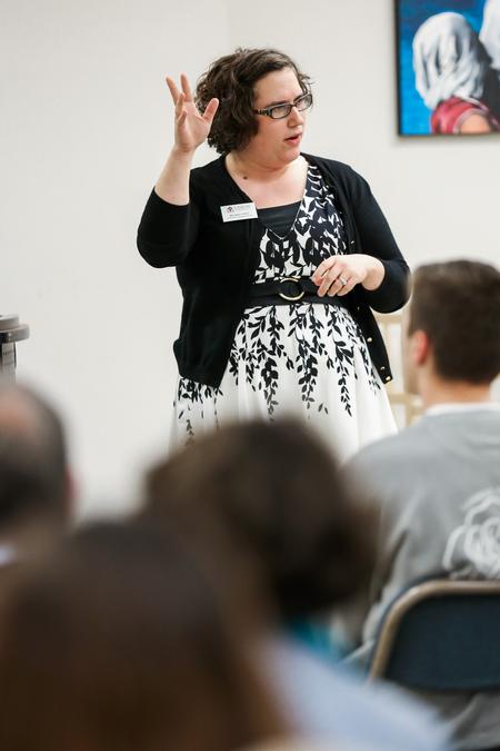Melinda Posey, assistant professor of art, gives a lecture about her gallery exhibit titled Dialogues.  - Photo by Kristi McMurry Woody