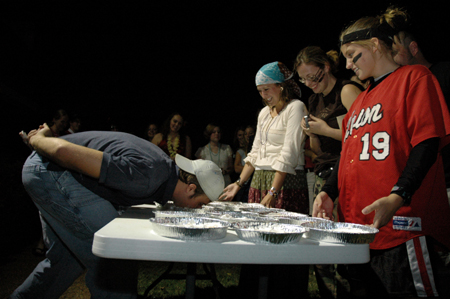 Residents participated in a pie-eating contest during the Hurt Costume Coffee House. - Photo by Amanda Herron