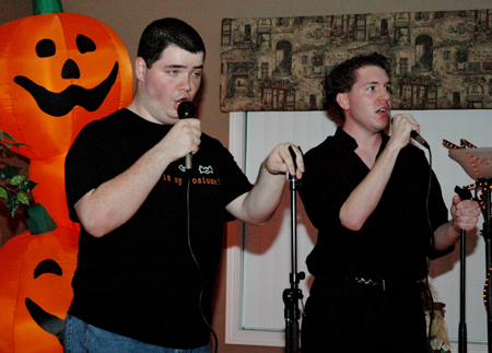Seniors Willie George and Jeremy Parker performed karaoke at the Hurt Costume Coffee House. - Photo by Amanda Herron
