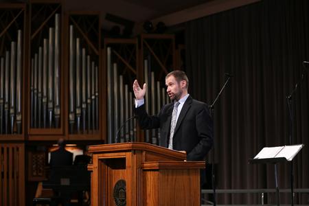 Dan Musselman, associate professor of music and acting chair, leads music in chapel. - Photo by Kristi McMurry Woody
