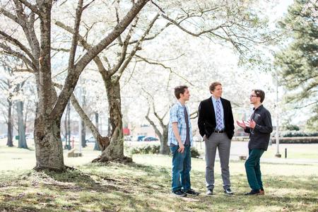 Jay Beavers, assistant professor of English, talks with Ian Malone and Josh Welsch after class.  - Photo by Kristi McMurry Woody