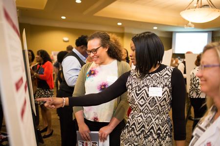 Nursing students present their projects to guests at the Scholarship Symposium in the Grant Events Center.  - Photo by Kristi McMurry Woody