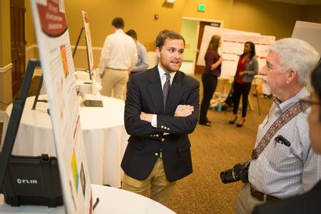 Joshua Shoemaker, junior engineering major, presents his projects during the Scholarship Symposium. - Photo by Kristi McMurry Woody
