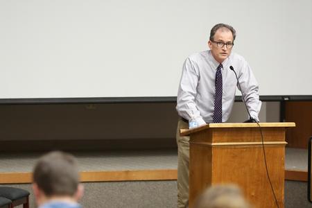 Bobby Rogers, professor of English and writer in residence, presents a reading from his new book of poetry, "Social History." - Photo by Kristi McMurry Woody