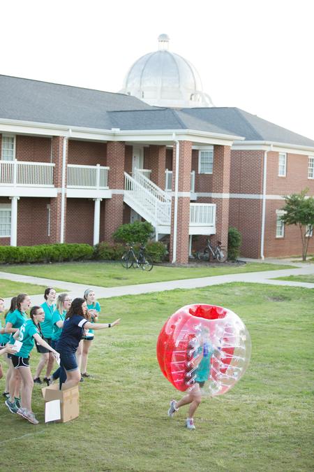 One of the teams competing for the Union Cup runs the final relay during Field Day. - Photo by Kristi McMurry Woody