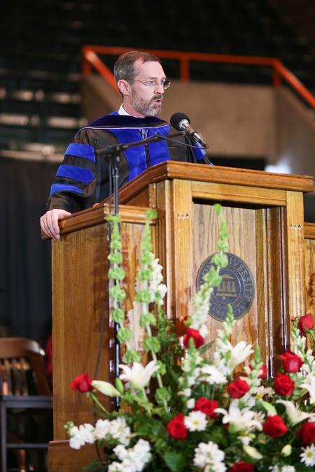 Gregory Wills, dean of the school of theology and David T. Porter professor of church history at The Southern Baptist Theological Seminary, speaks during spring commencement.  - Photo by Kristi McMurry Woody