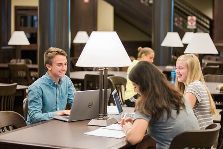 Gavin Hamann, freshman engineering major, Callie Hauss, freshman nursing major, and Todosita Torres, sophomore business major, study in the library.  - Photo by Kristi McMurry Woody